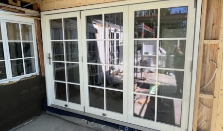 Sliding and folding doors with classic Scandinavian bars